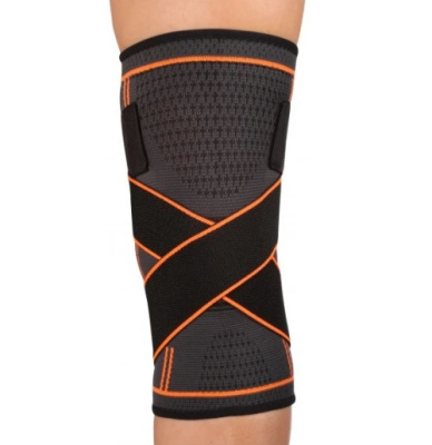 Суппорт колена INDIGO эластичный, с компрессионными лямками, черно-оранжевый